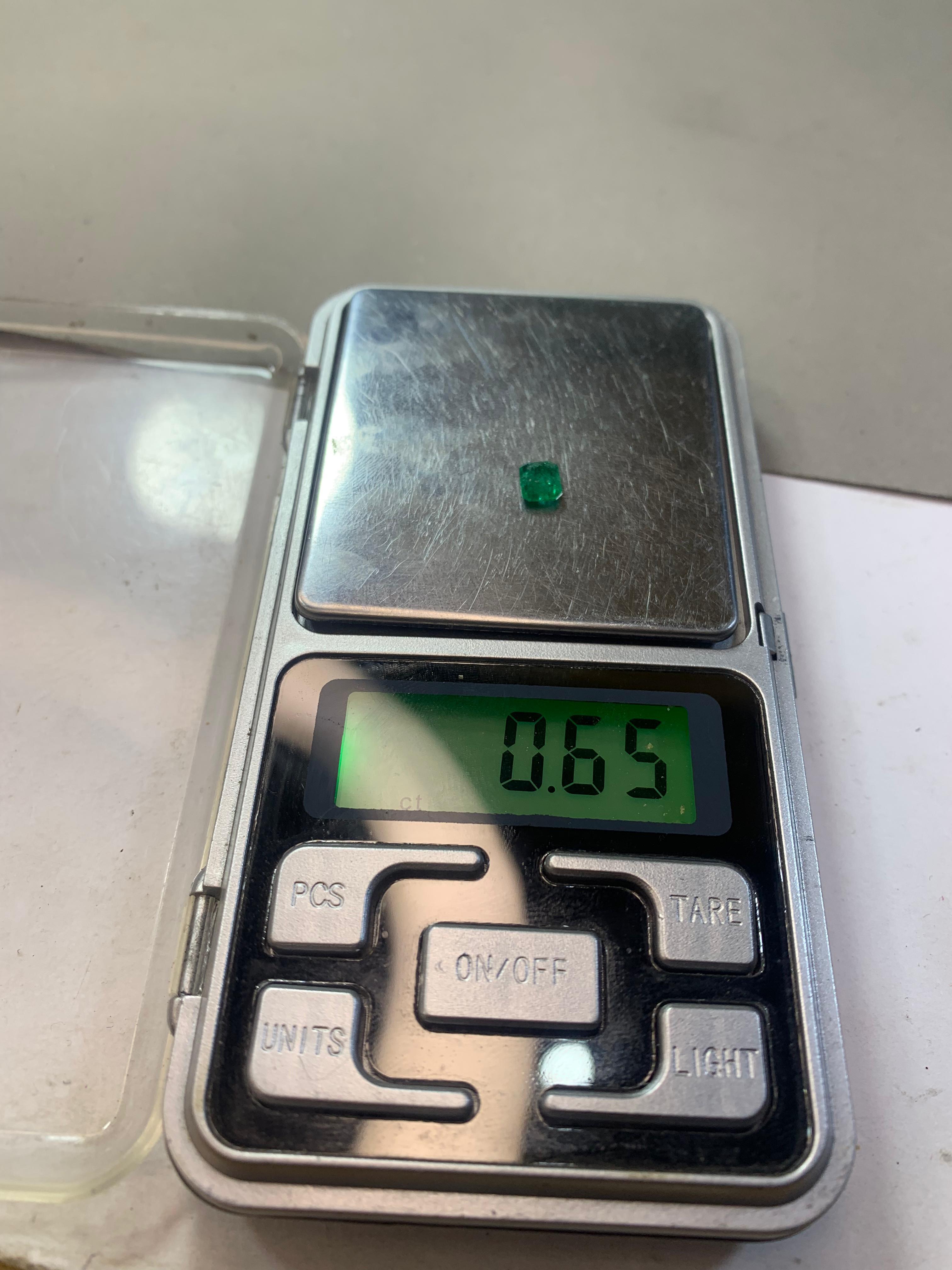 Check The Weight Of This Emerald Cut Stone