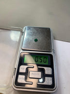Check The Weight Of This Emerald Stone Cut Stone
